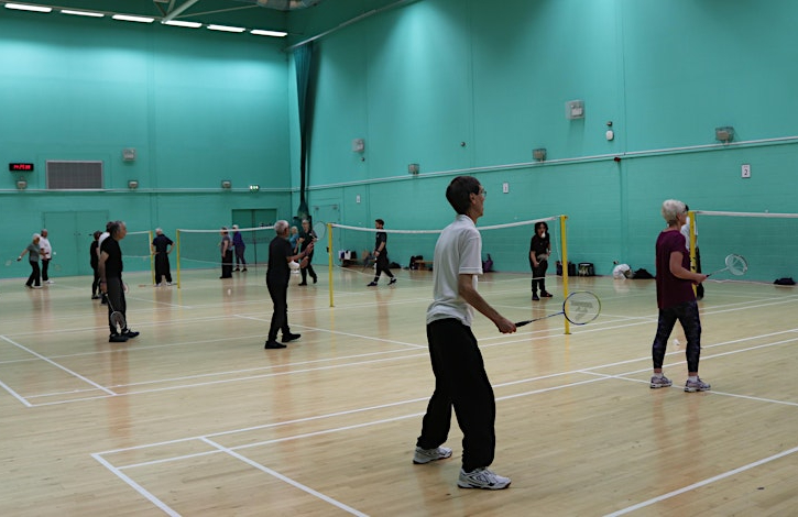 people playing badminton at live longer better Herts Hertfordshire Celebration Day.